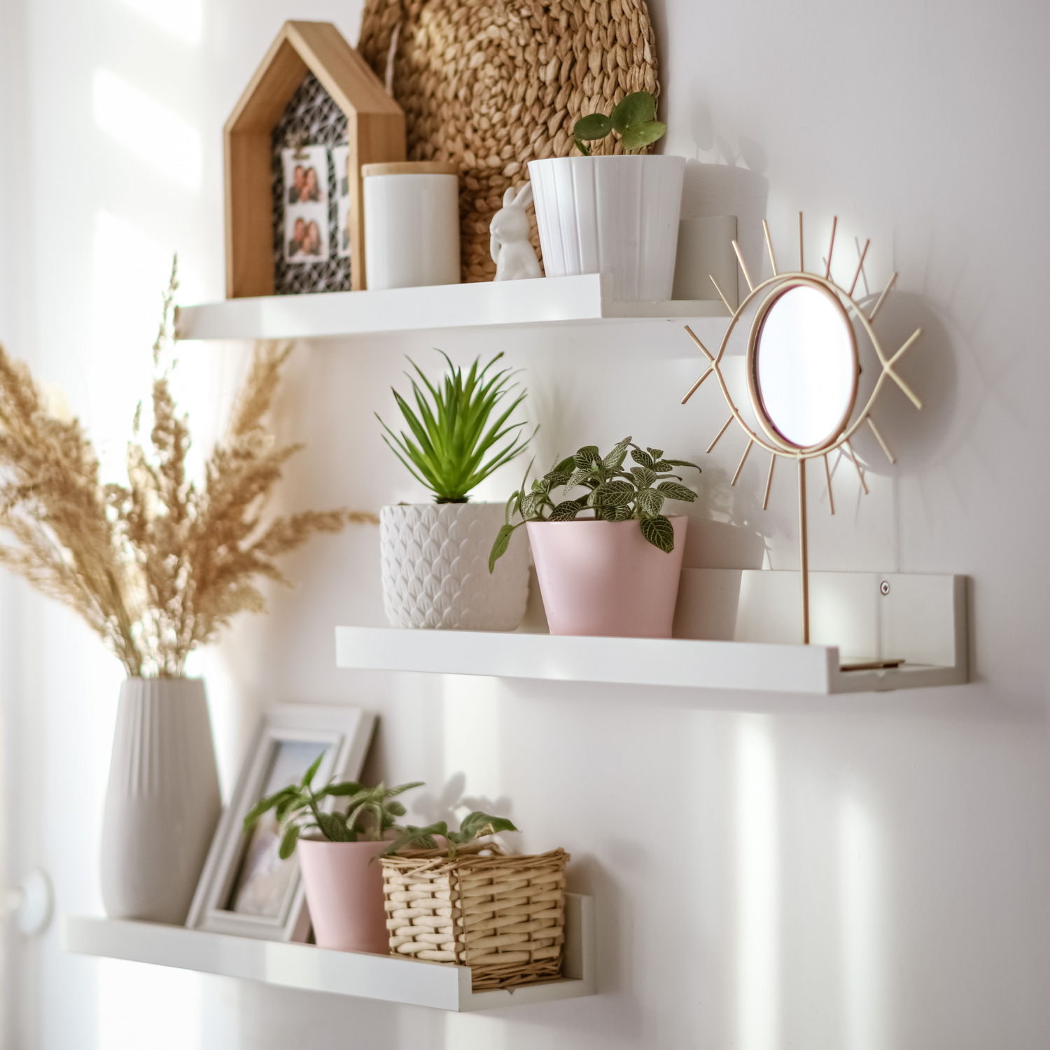 A beautifully decorated bookshelf showcasing various items from Lottie Elizabeth Ltd's blog, adding style and charm to any space.