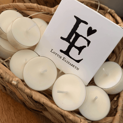 Image of our Lottie Elizabeth Ltd gift box tea lights candles: Sustainably packaged. Perfect for weddings, events, and gifts. Made from natural soy wax. Keywords: tea light, tea lights, tealights, nature, soy wax, soywax, vegan, eco-friendly, unscented candle, 16. GLIMMA.