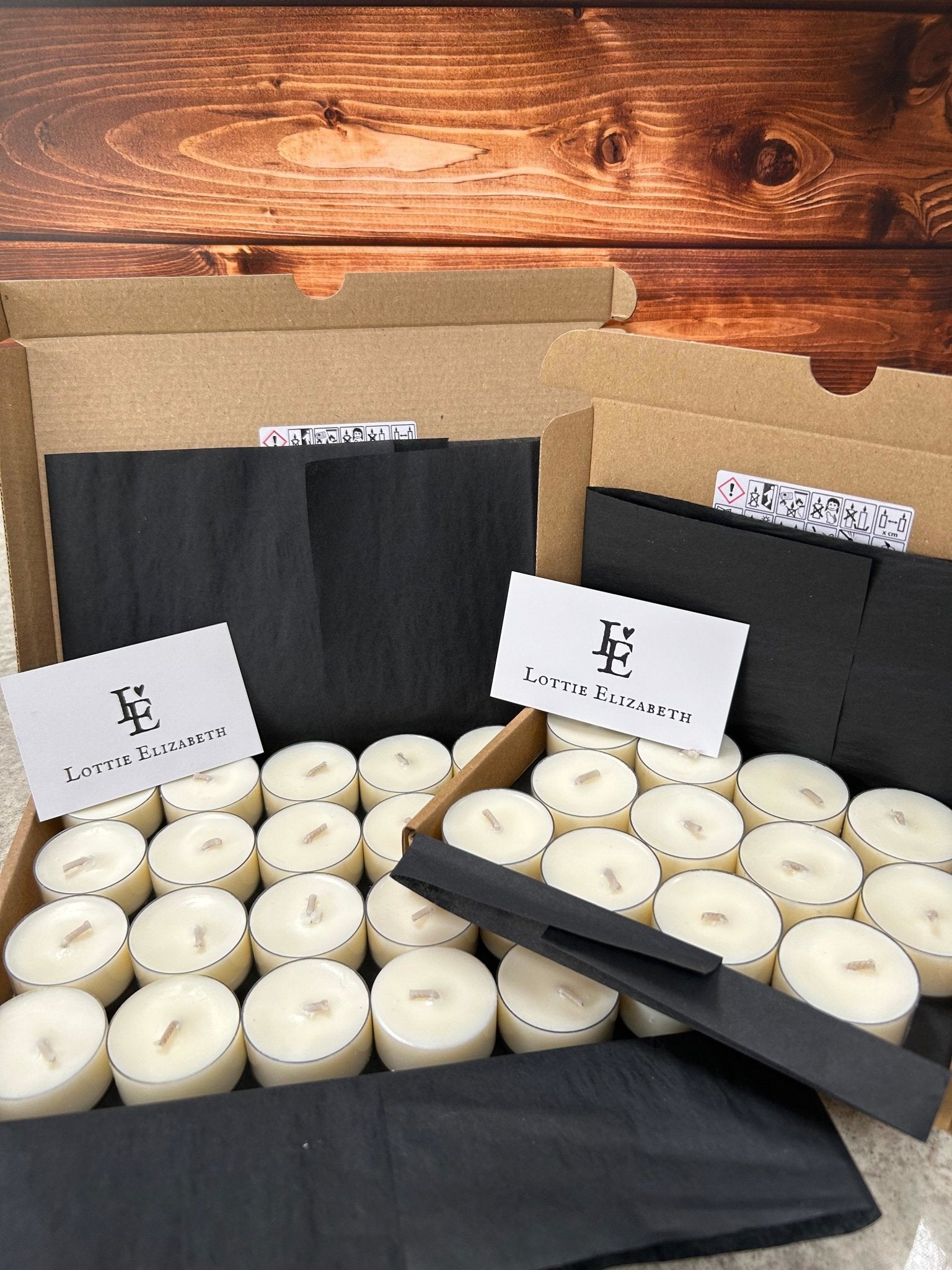 Image of our Lottie Elizabeth Ltd letterbox tea lights candles: Sustainably packaged. Perfect for weddings, events, and gifts. Made from natural soy wax. Keywords: tea light, tea lights, tealights, nature, soy wax, soywax, vegan, eco-friendly, unscented candle, 6, 12, 24. GLIMMA. Picture of 2 variants 12 and 24