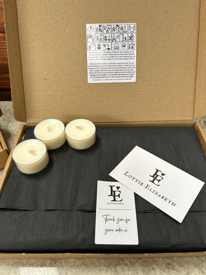 Image of our Lottie Elizabeth Ltd letterbox tea lights candles: Sustainably packaged. Perfect for weddings, events, and gifts. Made from natural soy wax. Keywords: tea light, tea lights, tealights, nature, soy wax, soywax, vegan, eco-friendly, unscented candle, 6, 12, 24. GLIMMA. Picture of 24 including safety card and thank you